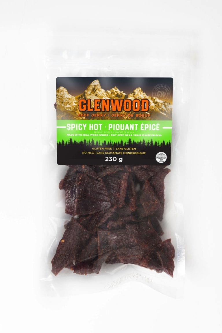 Glenwood Beef Jerky Spicy Hot 230g in clear resealable bag with mountain label and visible jerky pieces.