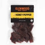 Glenwood Honey Pepper beef jerky 10oz package showing dark seasoned beef pieces in clear sealed bag.
