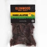 Glenwood Mango Jalapeno beef jerky 10oz package showing dark beef pieces in clear vacuum-sealed bag.