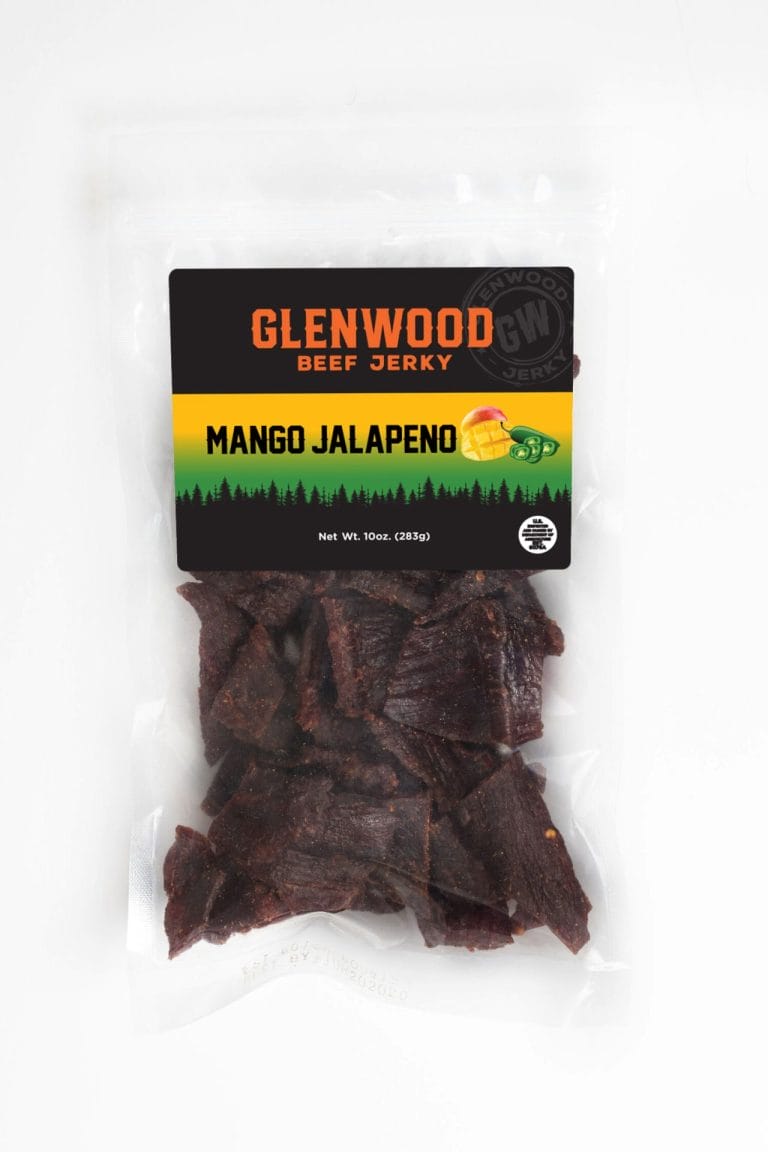 Glenwood Mango Jalapeno beef jerky 10oz package showing dark beef pieces in clear vacuum-sealed bag.