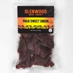 Glenwood Maui Sweet Onion Beef Jerky 9oz bag with sunset palm label and visible jerky pieces.