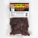 Glenwood Maui Sweet Onion Beef Jerky in clear resealable bag with sunset palm label and visible pieces.