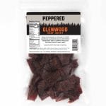 Glenwood Peppered Beef Jerky in clear resealable bag with label and visible jerky pieces.