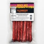 Glenwood Spicy Hot meat sticks in clear resealable bag with front nutrition label.