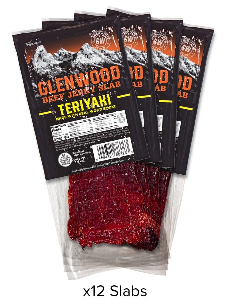 Set of twelve Glenwood Teriyaki Beef Jerky Slabs in black packaging made with real wood smoke.