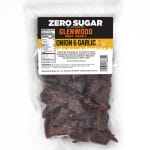 Glenwood Zero Sugar Onion & Garlic beef jerky 10oz package with dark jerky pieces in clear vacuum-sealed bag.